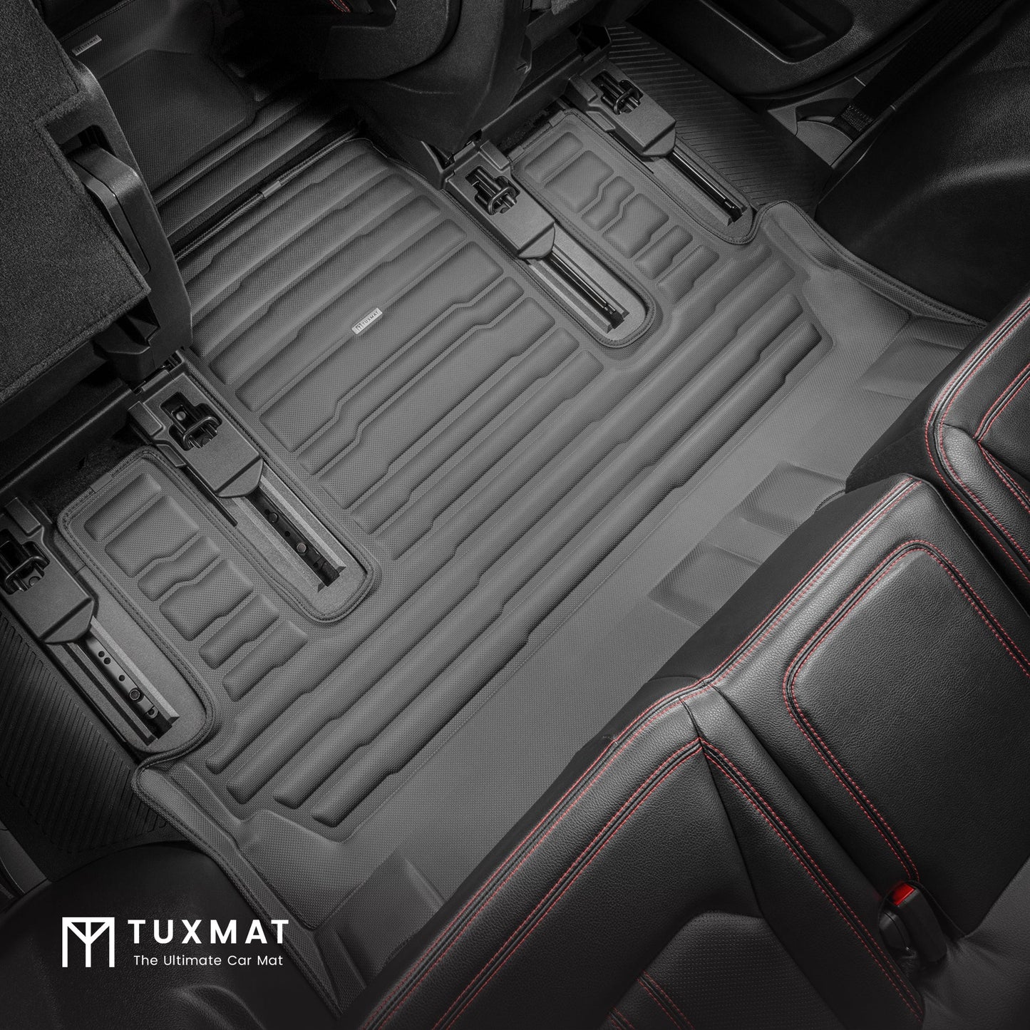 A set of black TuxMat car floor mats for Ford Expedition models.
