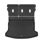 A set of black TuxMat trunk mats for Subaru Impreza models.