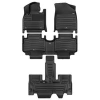 A set of black TuxMat car floor mats for Hyundai Palisade models.