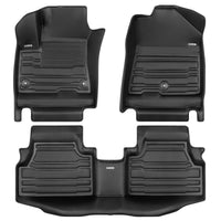 A set of black TuxMat car floor mats for Kia Soul models.