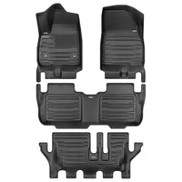 A set of black TuxMat car floor mats for GMC Acadia models.