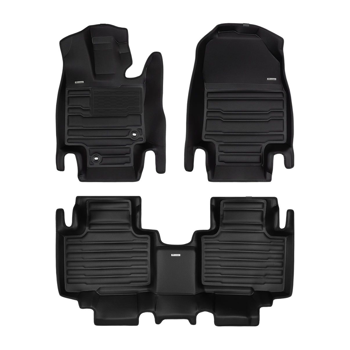A set of black TuxMat car floor mats for Toyota Highlander models.