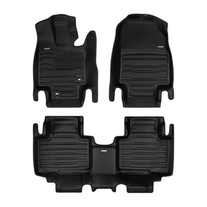 A set of black TuxMat car floor mats for Toyota Highlander models.