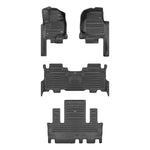 A set of black TuxMat car floor mats for Ford Expedition models.