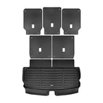 A set of black TuxMat car floor mats for Lincoln Aviator models.