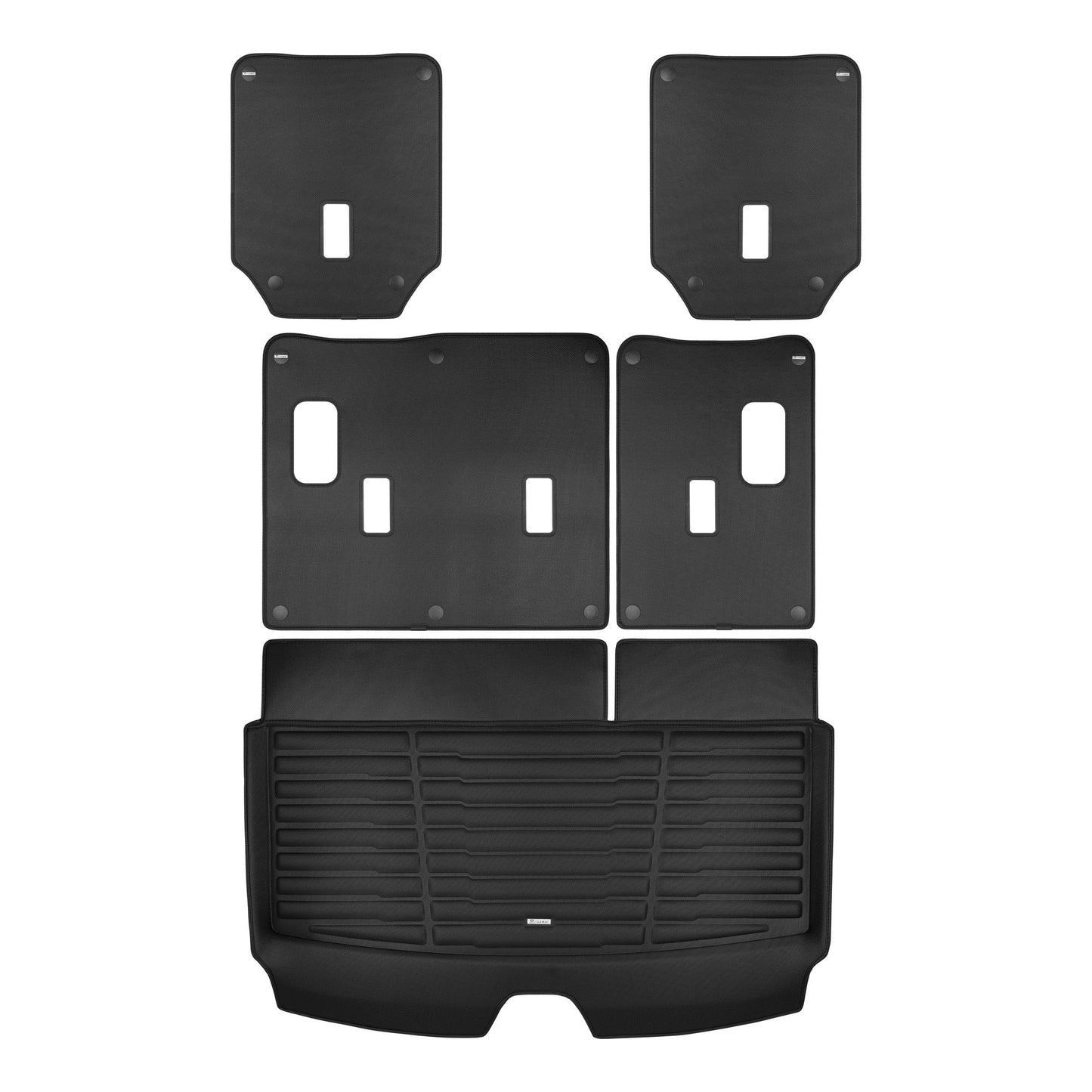 A set of black TuxMat trunk mats for GMC Yukon models.