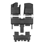 A set of black TuxMat car floor mats for Kia Sorento models.