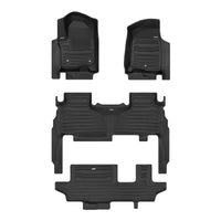 A set of black TuxMat car floor mats for Cadillac Escalade models.