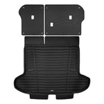 A set of black TuxMat trunk mats for Kia Sportage models.