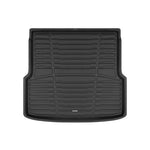 A set of black TuxMat trunk mats for BMW i4 models.