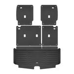 A set of black TuxMat trunk mats for Nissan Pathfinder models.