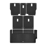 A set of black TuxMat car floor mats for Land Rover Range Rover models.
