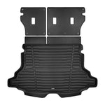 A set of black TuxMat trunk mats for Subaru Forester models.