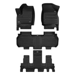 A set of black TuxMat car floor mats for Chevrolet Traverse 7-Seater models.