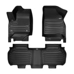 A set of black TuxMat car floor mats for GMC Acadia models.