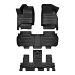 A set of black TuxMat car floor mats for GMC Acadia models.