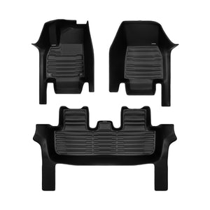 A set of black TuxMat car floor mats for Tesla Model Y models.