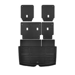 A set of black TuxMat trunk mats for Cadillac Escalade models.