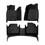 A set of black TuxMat car floor mats for Genesis GV70 models.