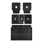 A set of black TuxMat trunk mats for Ford Expedition models.