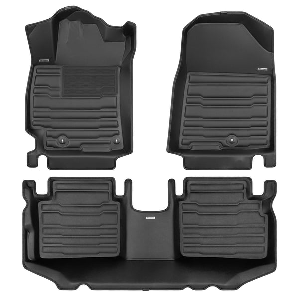 A set of black TuxMat car floor mats for Kia Forte models.