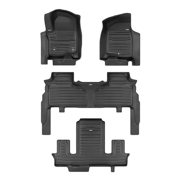 A set of black TuxMat car floor mats for GMC Yukon models.