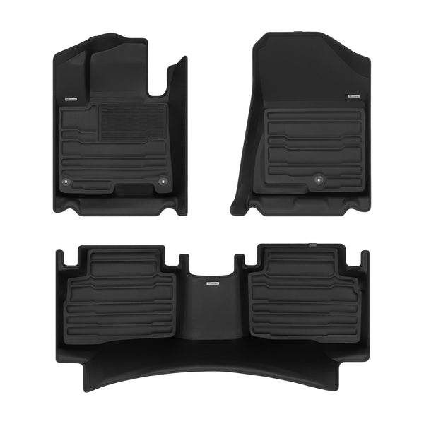 A set of black TuxMat car floor mats for Kia Sportage models.